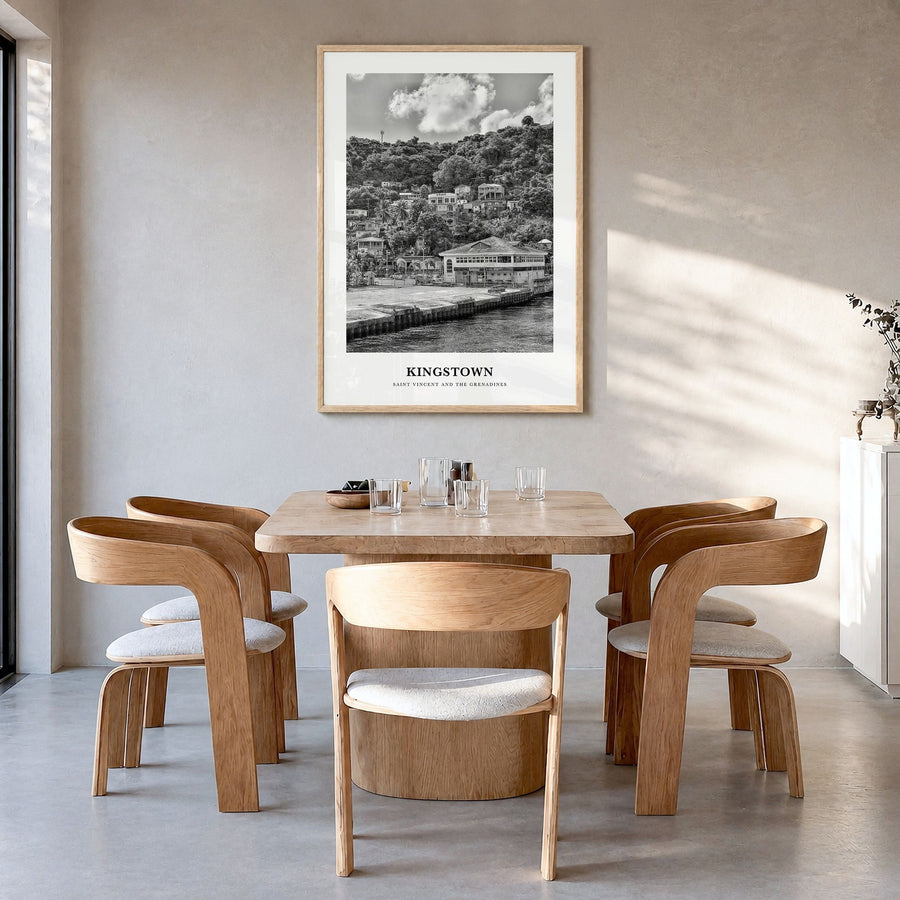 Kingstown Classic Poster in a natural wood frame, hanging in a dining room