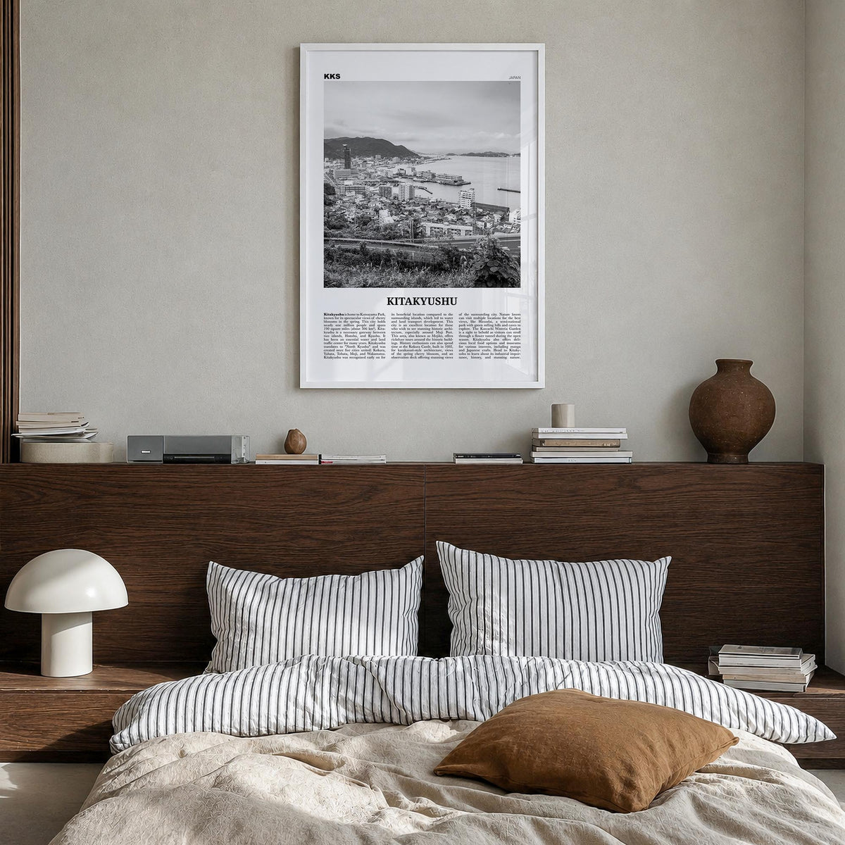 Kitakyushu black & white newspaper poster of Japan – vertical wall art in white wood frame, hanging on wall