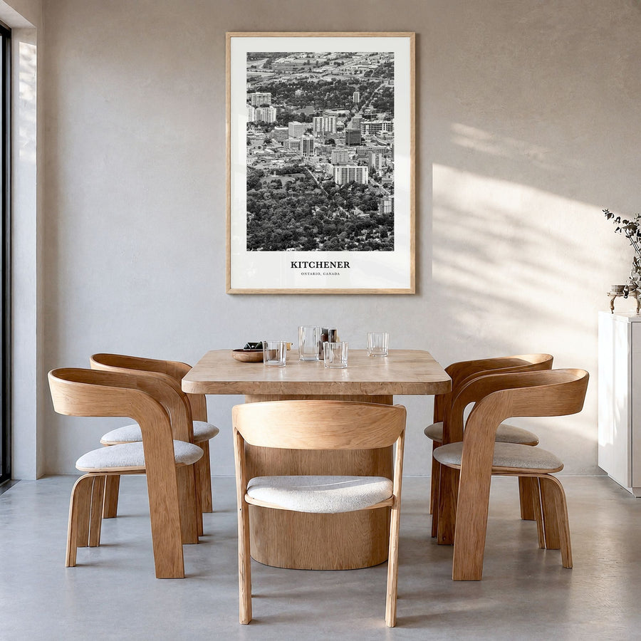 Kitchener Classic Poster in a natural wood frame, hanging in a dining room