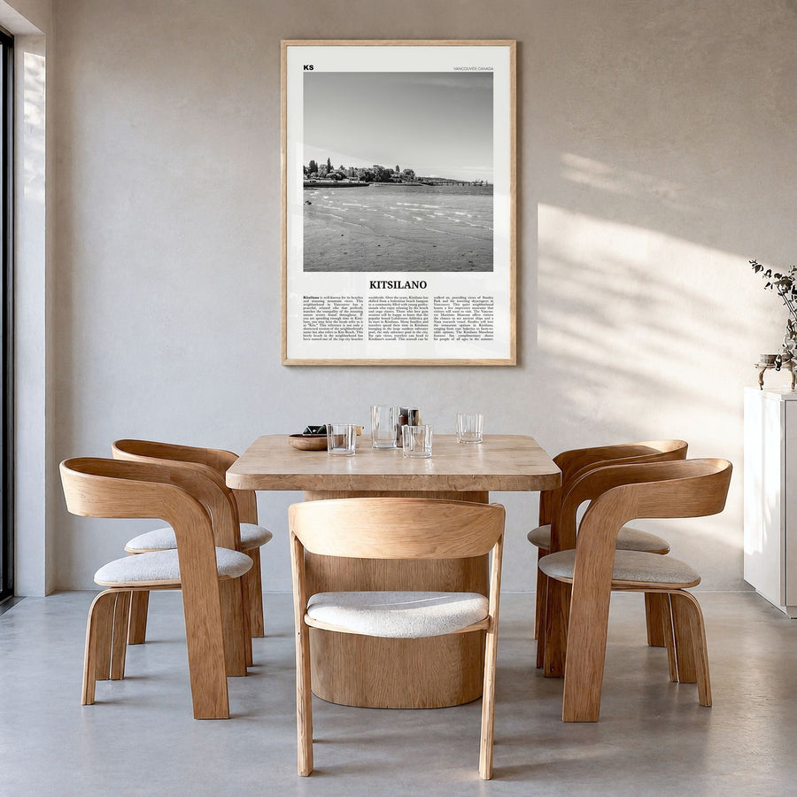 Kitsilano Newspaper Poster in a natural wood frame, hanging in a dining room