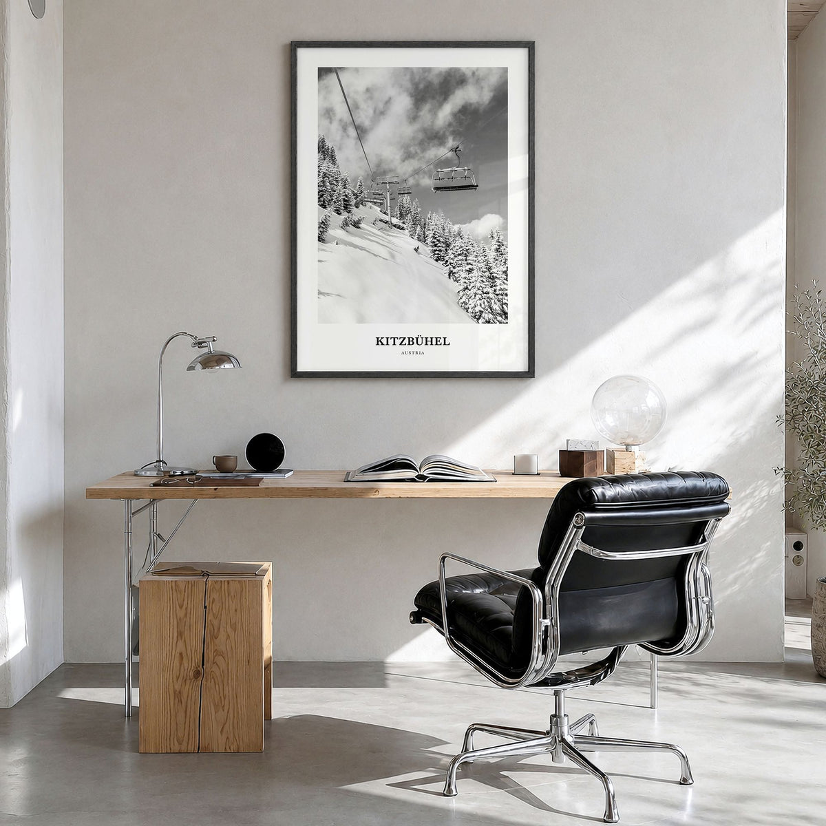 Kitzbühel Classic Poster in a black wood frame, hanging in a bright home office
