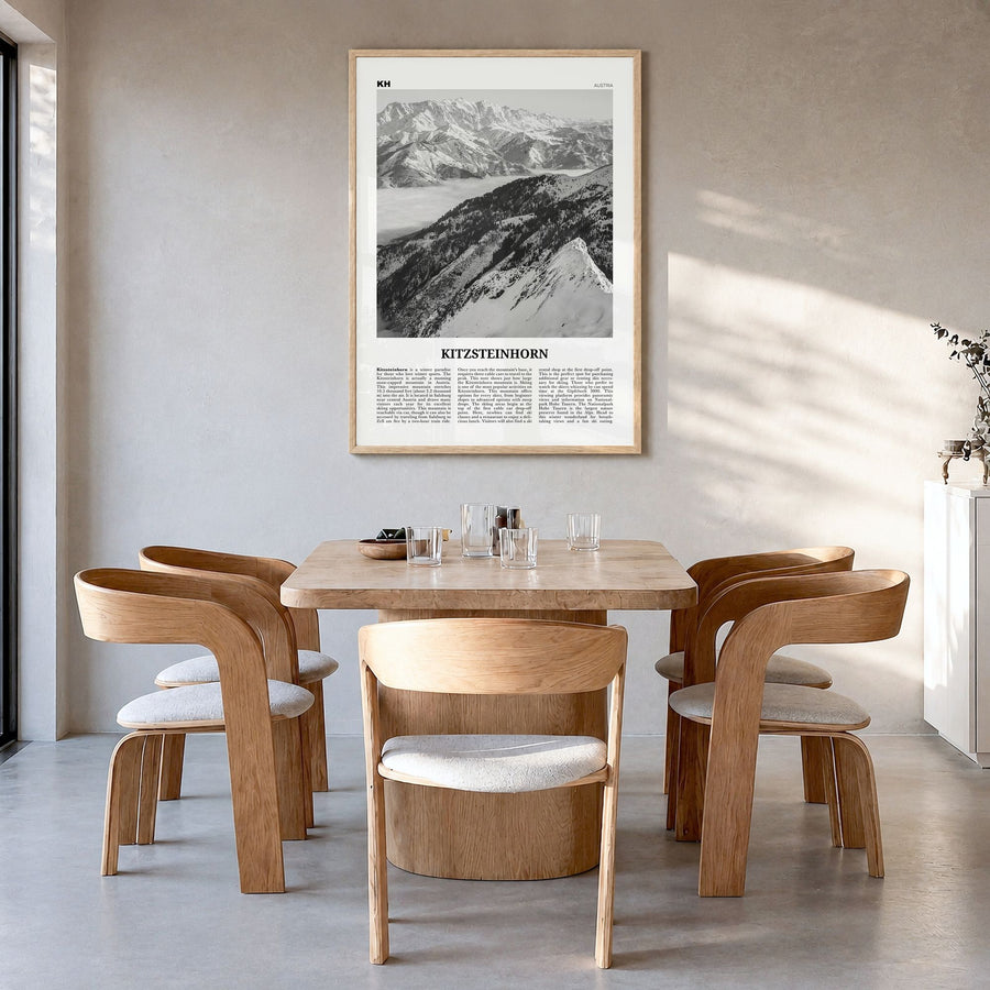 Kitzsteinhorn Newspaper Poster in a natural wood frame, hanging in a dining room