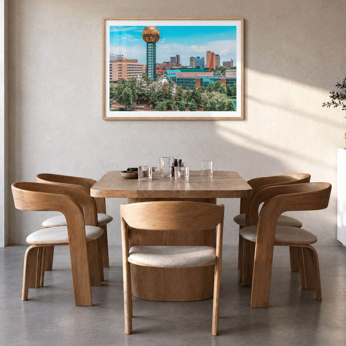 Knoxville Photo Poster in a natural wood frame, hanging in a dining room, white border