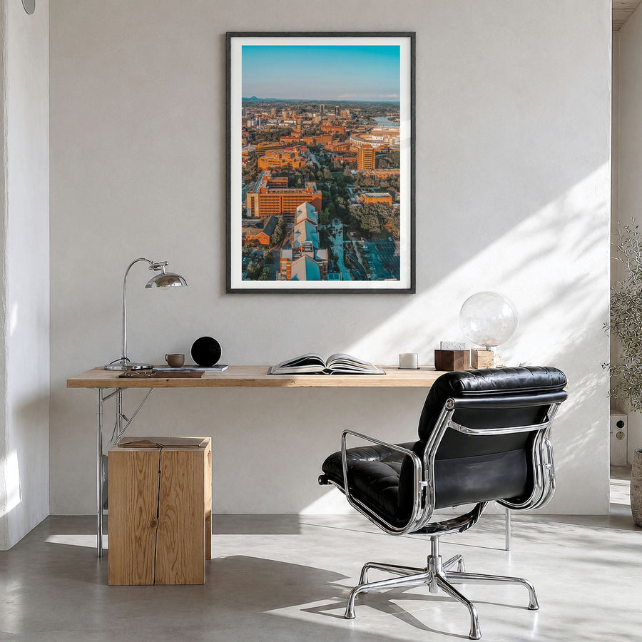 Knoxville Photo No 2 Poster in a black wood frame, hanging in a bright home office, white border