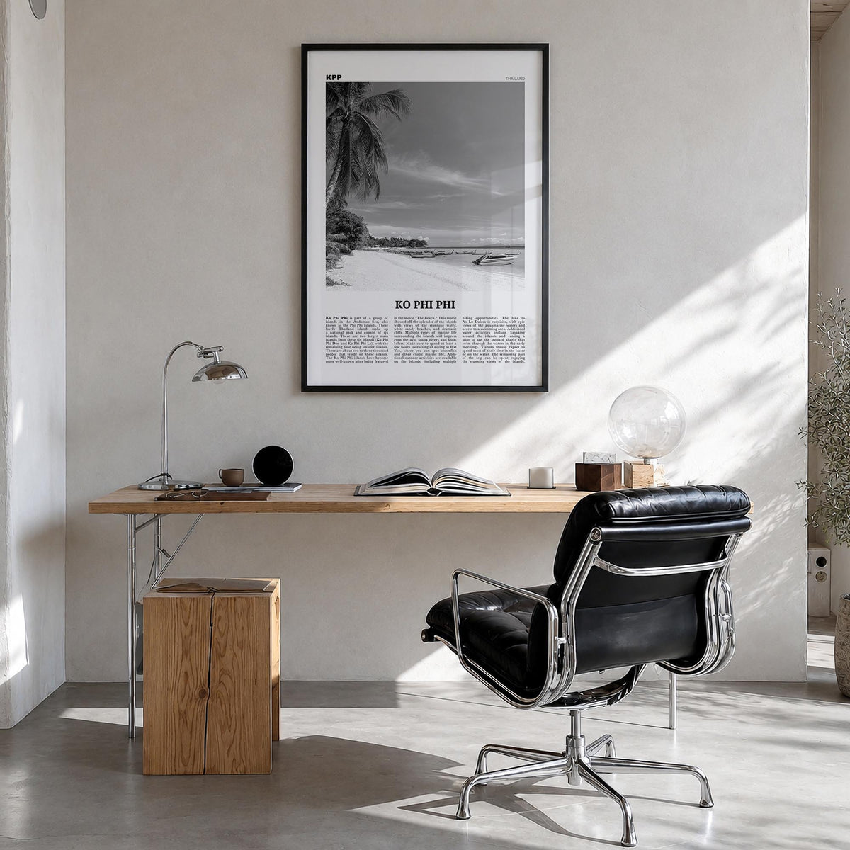 Phi Phi Islands no. 1 black & white newspaper poster of Thailand – vertical wall art in black wood frame, hanging on wall