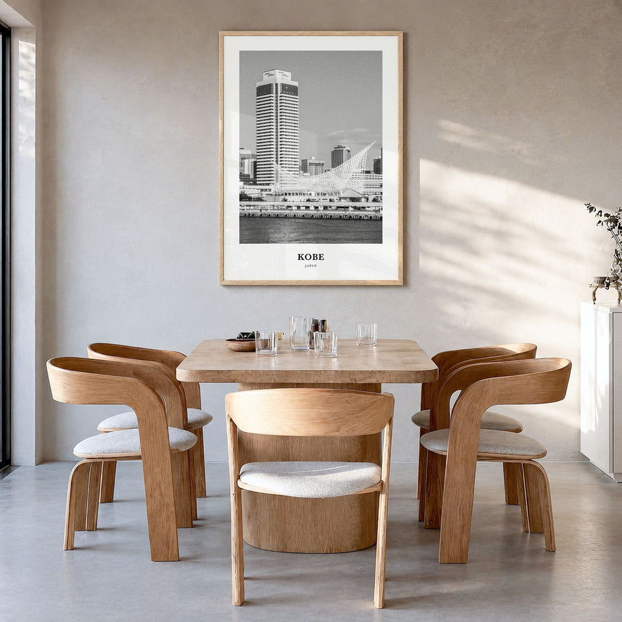 Kobe Classic Poster in a natural wood frame, hanging in a dining room