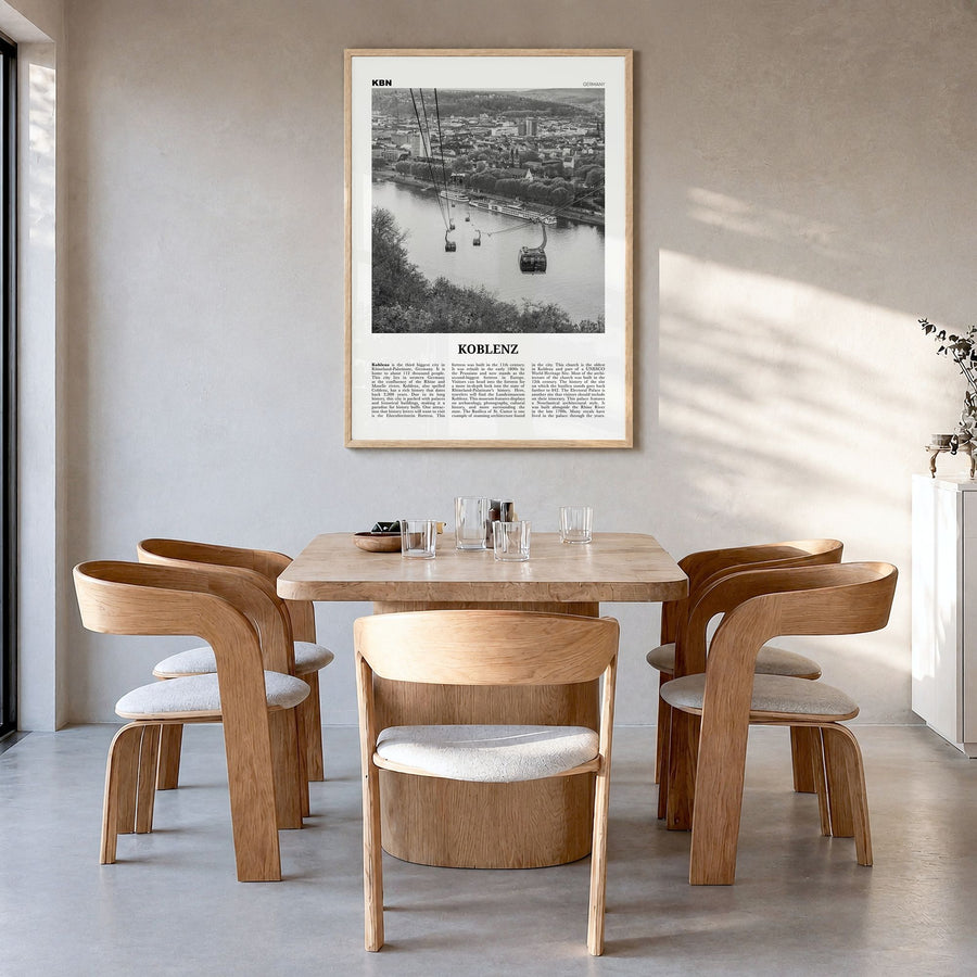 Koblenz Newspaper Poster in a natural wood frame, hanging in a dining room