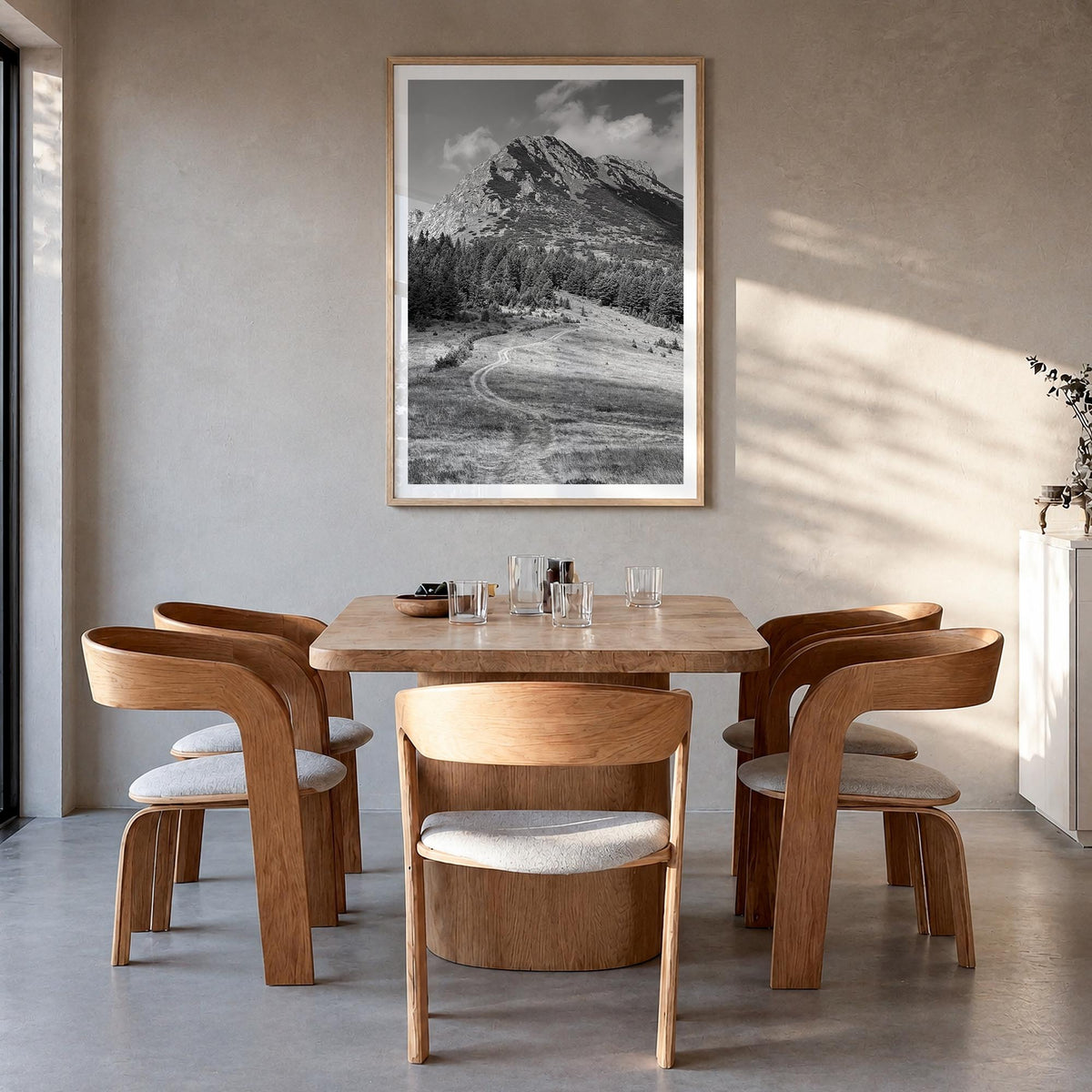 Kosovo black & white photo poster of Europe – vertical wall art in natural wood frame with white border, hanging on wall