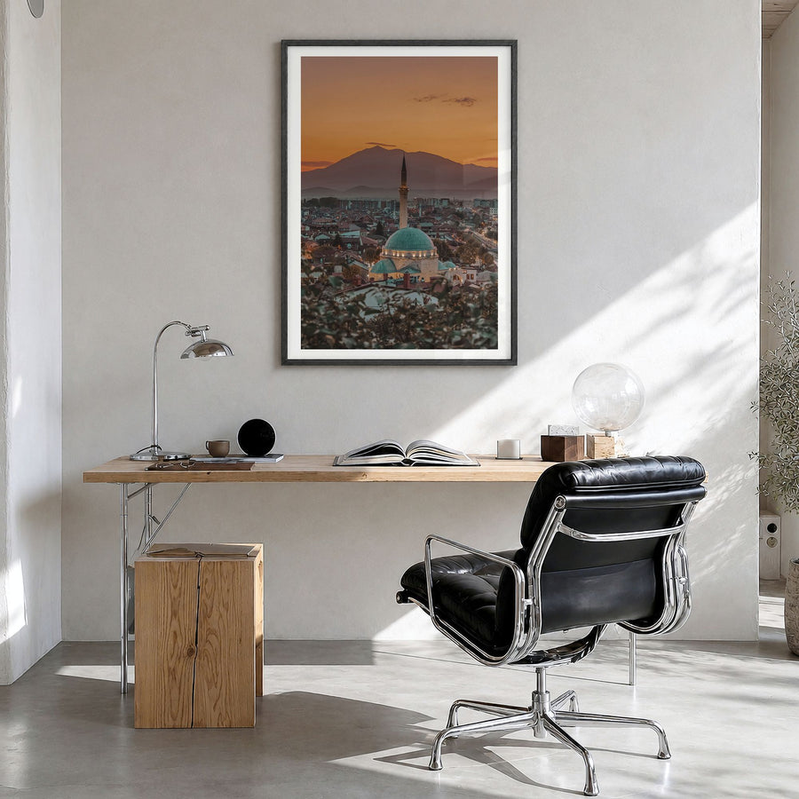 Kosovo Photo Poster in a black wood frame, hanging in a bright home office, white border