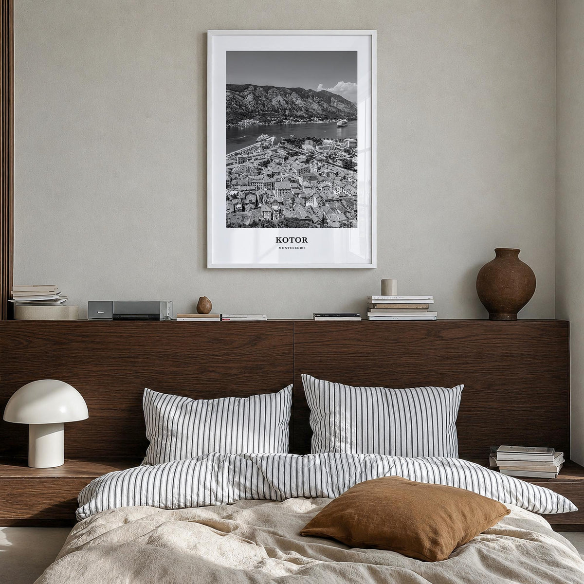 Kotor black & white classic poster of Montenegro – vertical wall art in white wood frame, hanging on wall