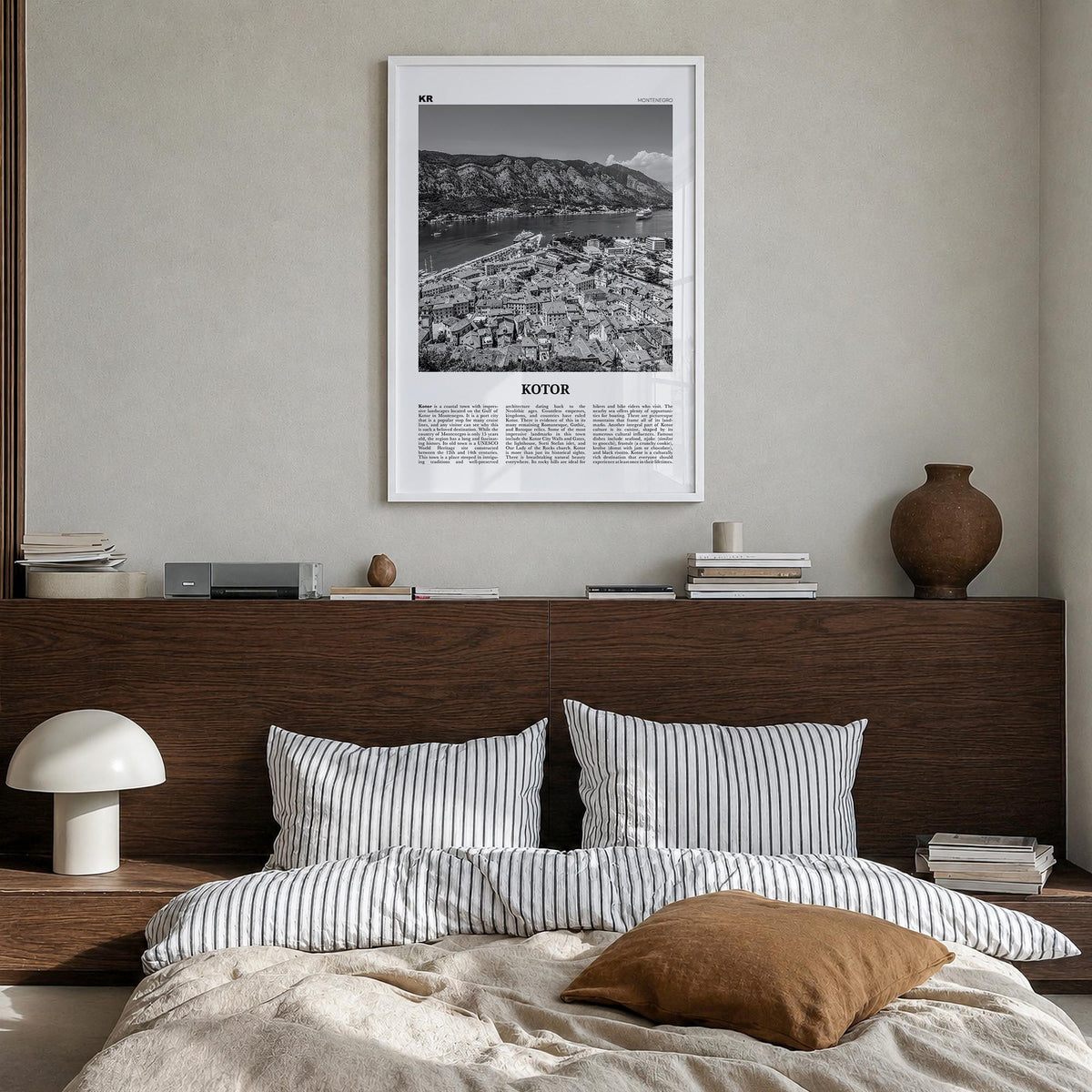 Kotor black & white newspaper poster of Montenegro – vertical wall art in white wood frame, hanging on wall