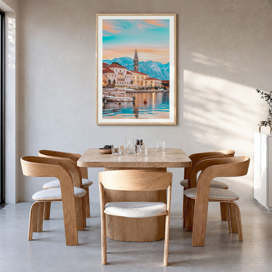Kotor Photo Poster in a natural wood frame, hanging in a dining room, white border