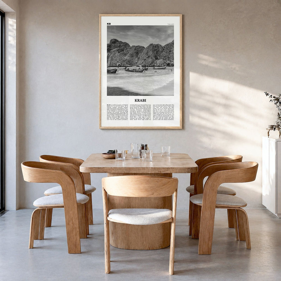 Krabi Newspaper Poster in a natural wood frame, hanging in a dining room