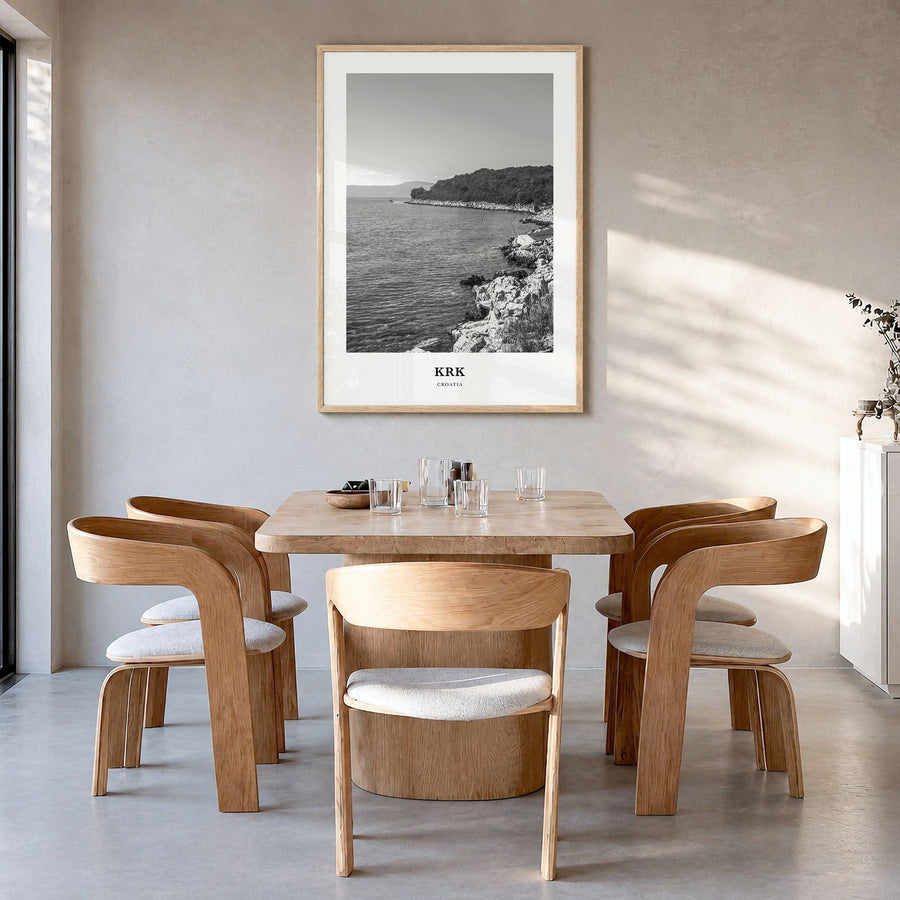 Krk Classic Poster in a natural wood frame, hanging in a dining room