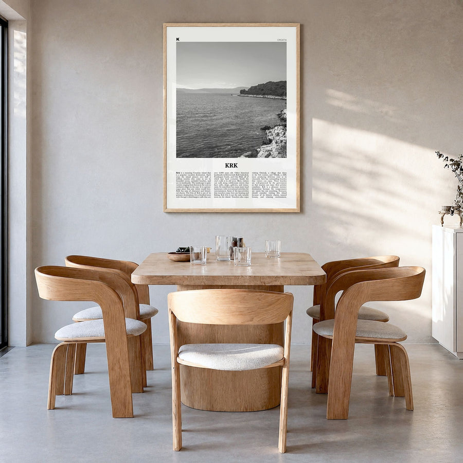 Krk Newspaper Poster in a natural wood frame, hanging in a dining room