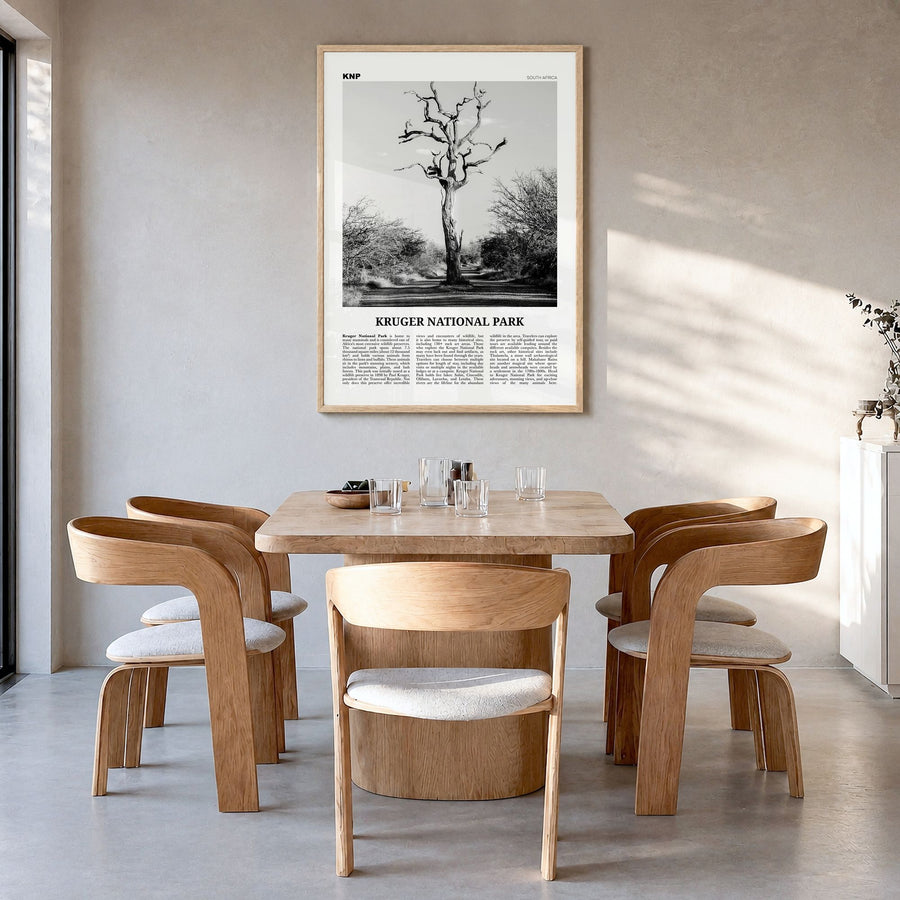 Kruger National Park Newspaper Poster in a natural wood frame, hanging in a dining room