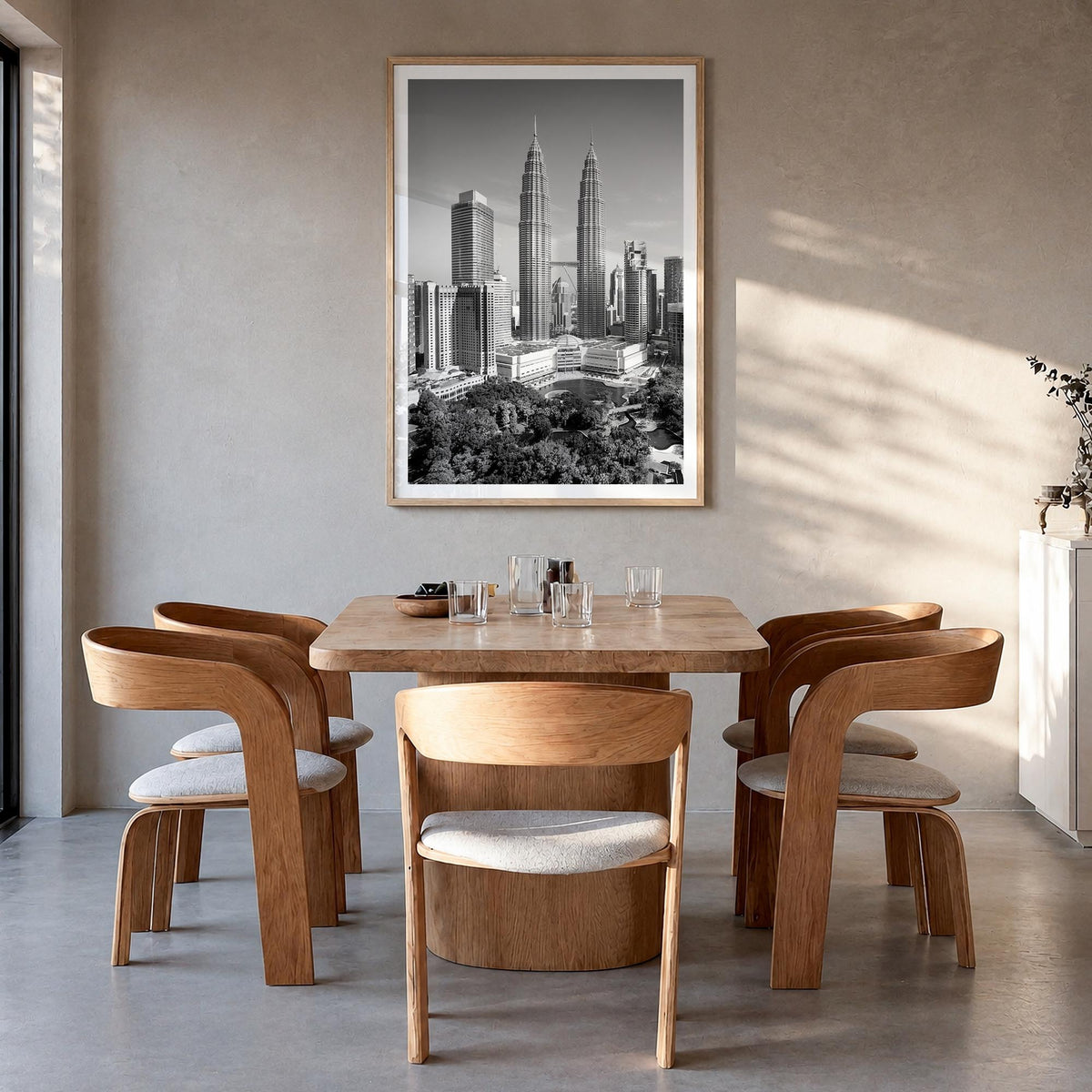 Kuala Lumpur black & white photo poster of Malaysia – vertical wall art in natural wood frame with white border, hanging on w