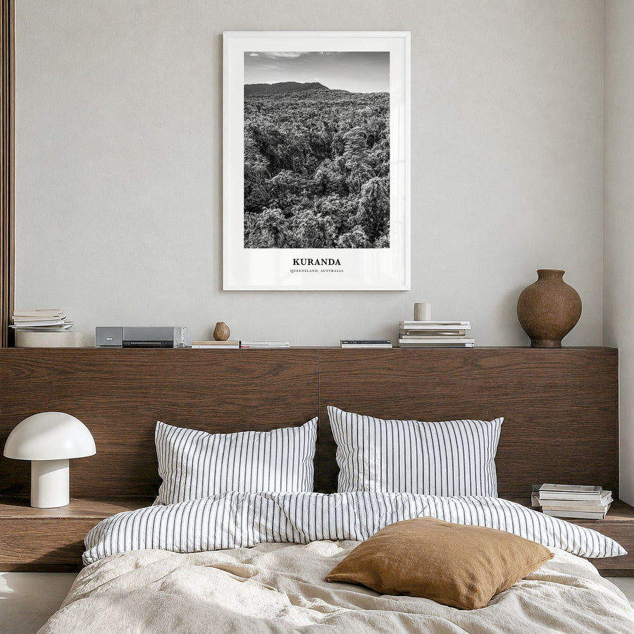 Kuranda Classic Poster in a white wood frame, hanging in a bedroom