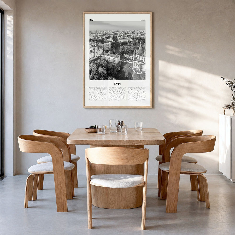 Kyiv Newspaper No 1 Poster in a natural wood frame, hanging in a dining room
