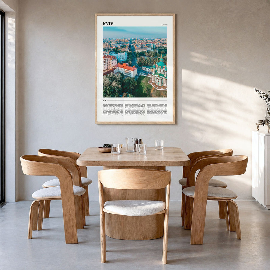 Kyiv Travel Poster in a natural wood frame, hanging in a dining room
