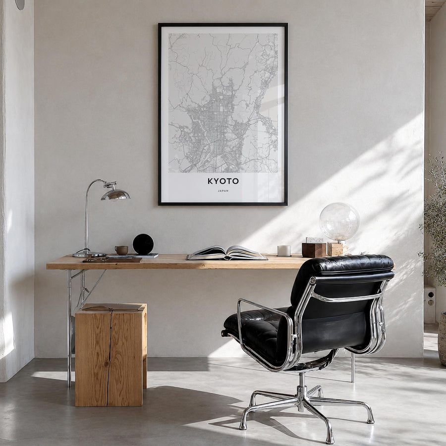 Kyoto black & white map poster of Japan – vertical wall art in black wood frame, hanging on wall