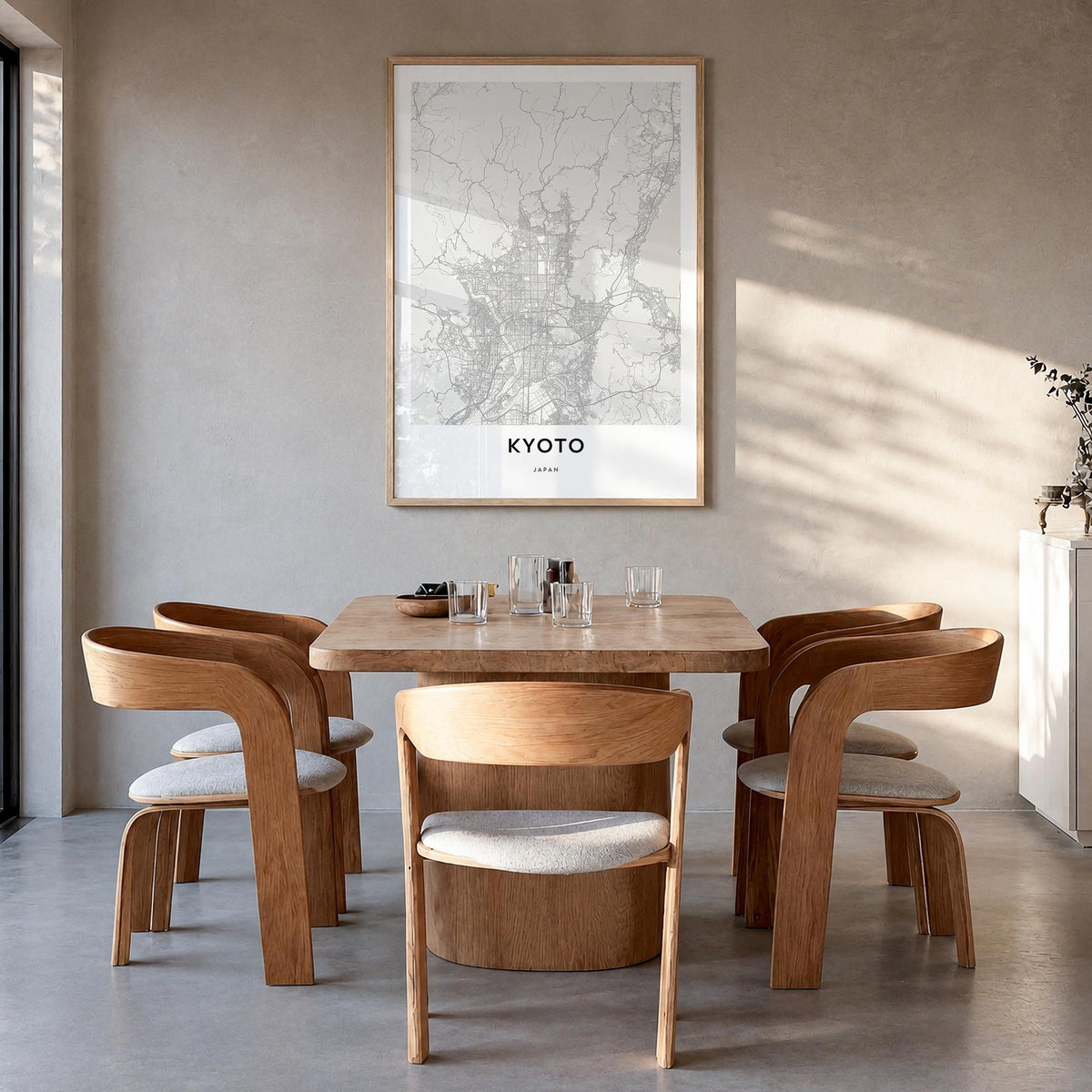 Kyoto black & white map poster of Japan – vertical wall art in natural wood frame, hanging on wall