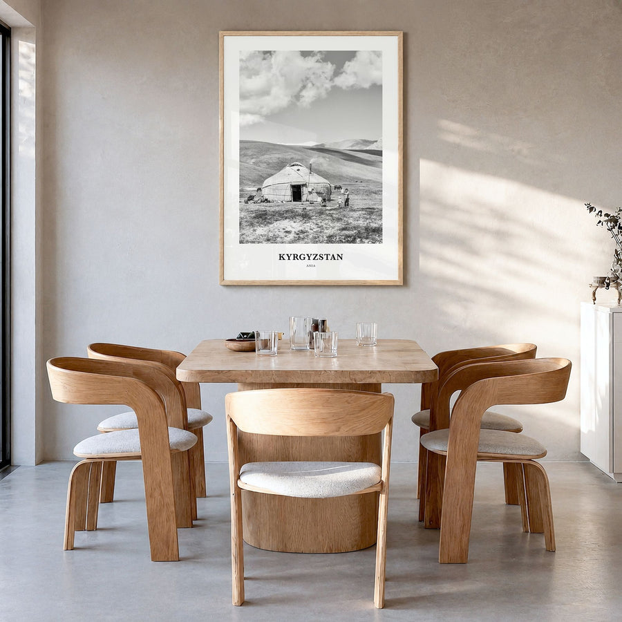 Kyrgyzstan Classic Poster in a natural wood frame, hanging in a dining room