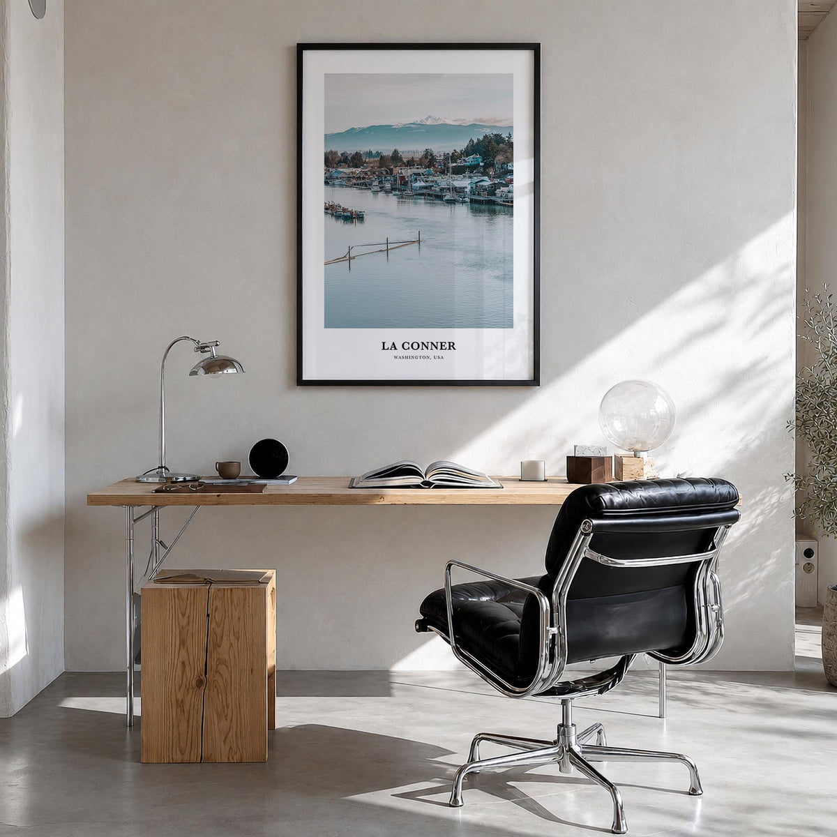 La Conner colorful classic poster of Washington, USA – vertical wall art in black wood frame, hanging on wall