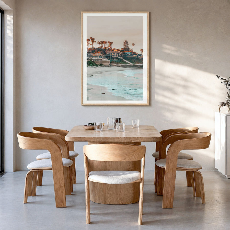 La Jolla Photo No 1 Poster in a natural wood frame, hanging in a dining room, white border