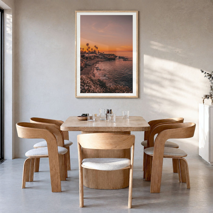 La Jolla Photo No 5 Poster in a natural wood frame, hanging in a dining room, white border