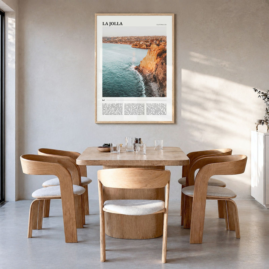 La Jolla Travel No 1 Poster in a natural wood frame, hanging in a dining room