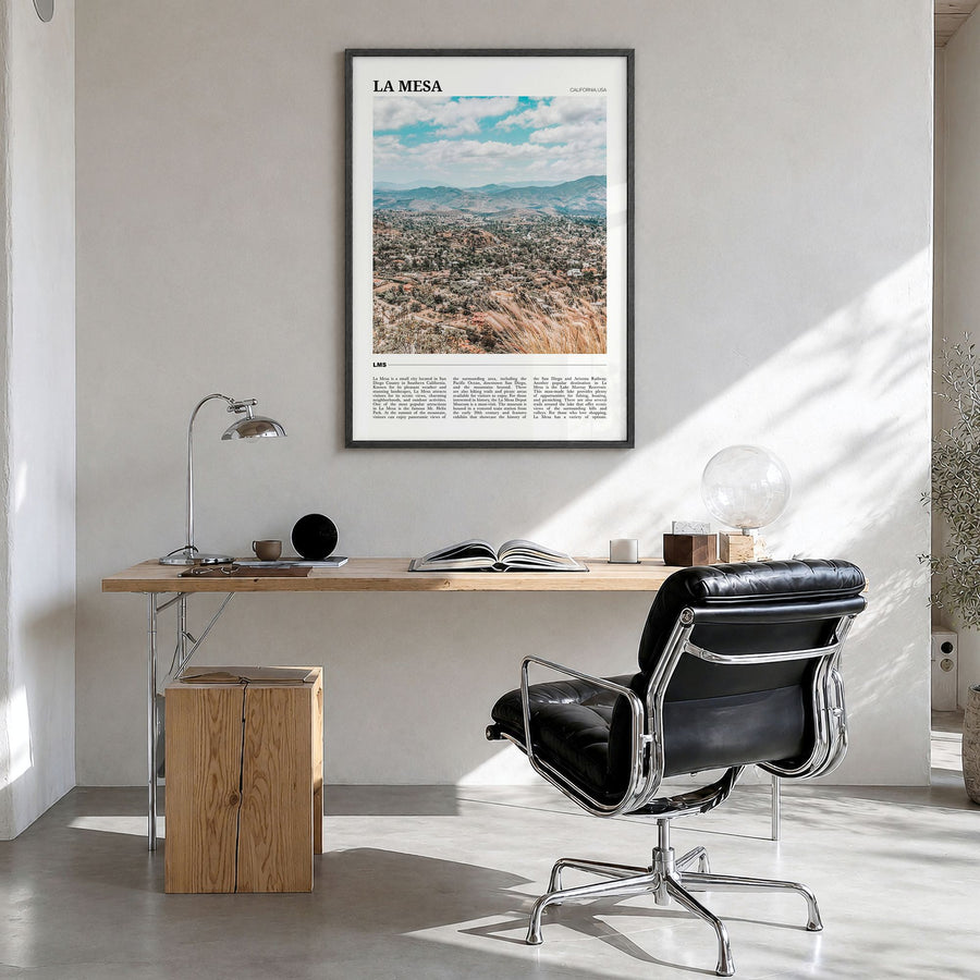 La Mesa Travel Poster in a black wood frame, hanging in a bright home office