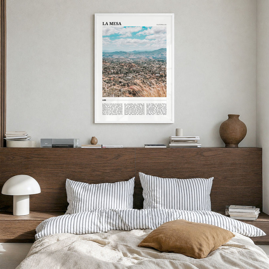 La Mesa Travel Poster in a white wood frame, hanging in a bedroom