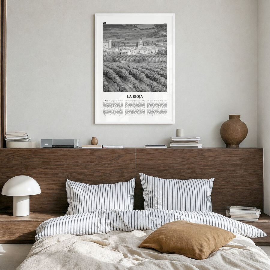 La Rioja Newspaper Poster in a white wood frame, hanging in a bedroom