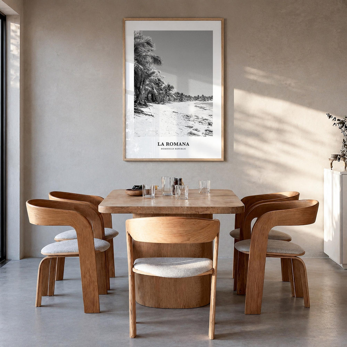 La Romana black & white classic poster of Dominican Republic – vertical wall art in natural wood frame, hanging on wall