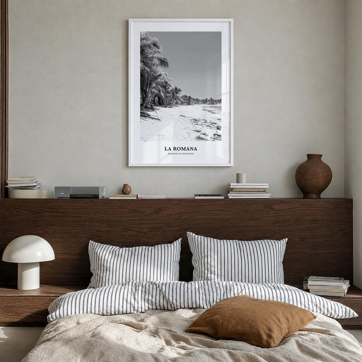 La Romana black & white classic poster of Dominican Republic – vertical wall art in white wood frame, hanging on wall