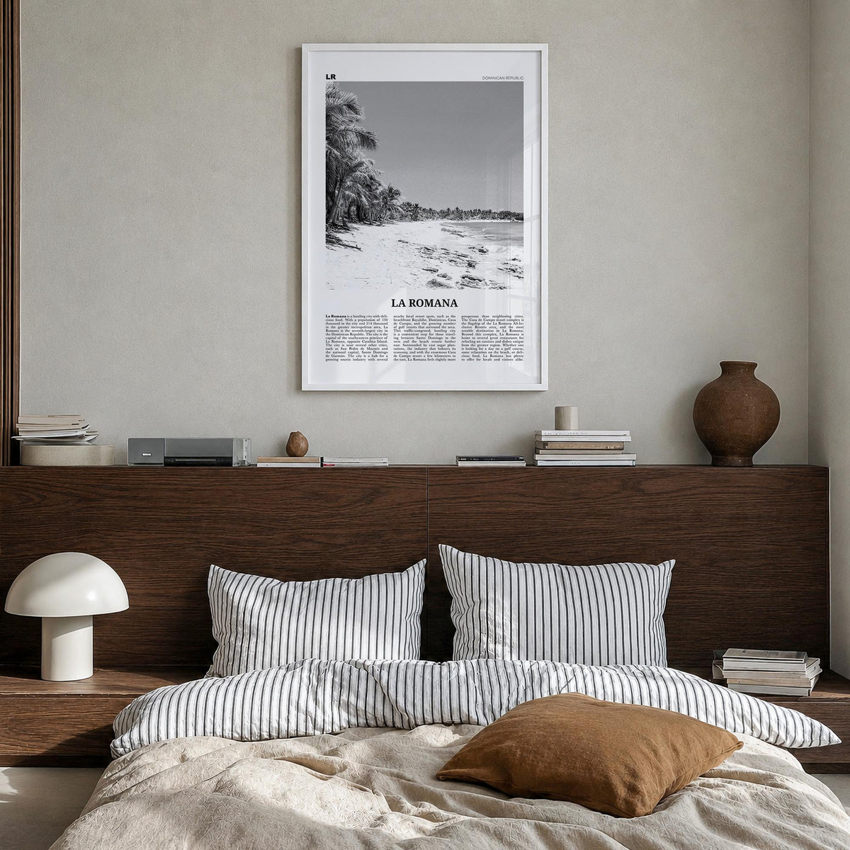 La Romana black & white newspaper poster of Dominican Republic – vertical wall art in white wood frame, hanging on wall