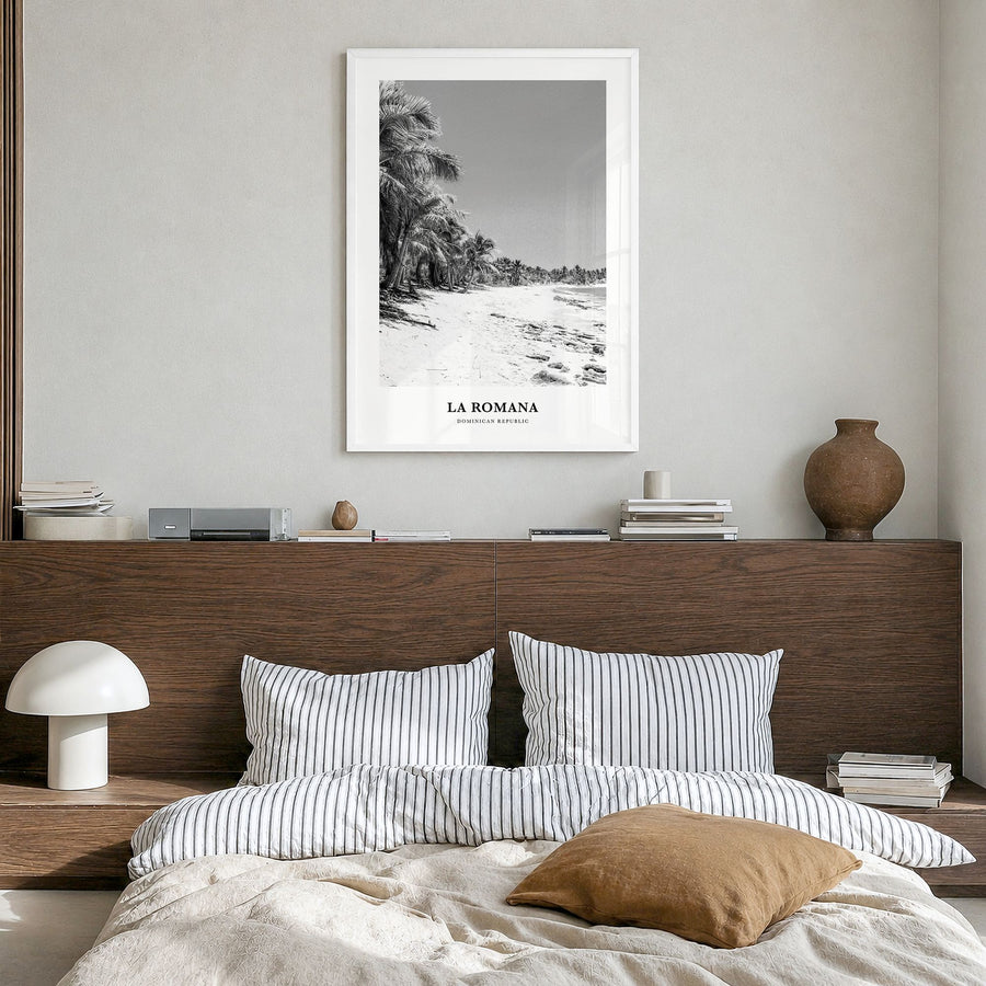 La Romana Classic Poster in a white wood frame, hanging in a bedroom