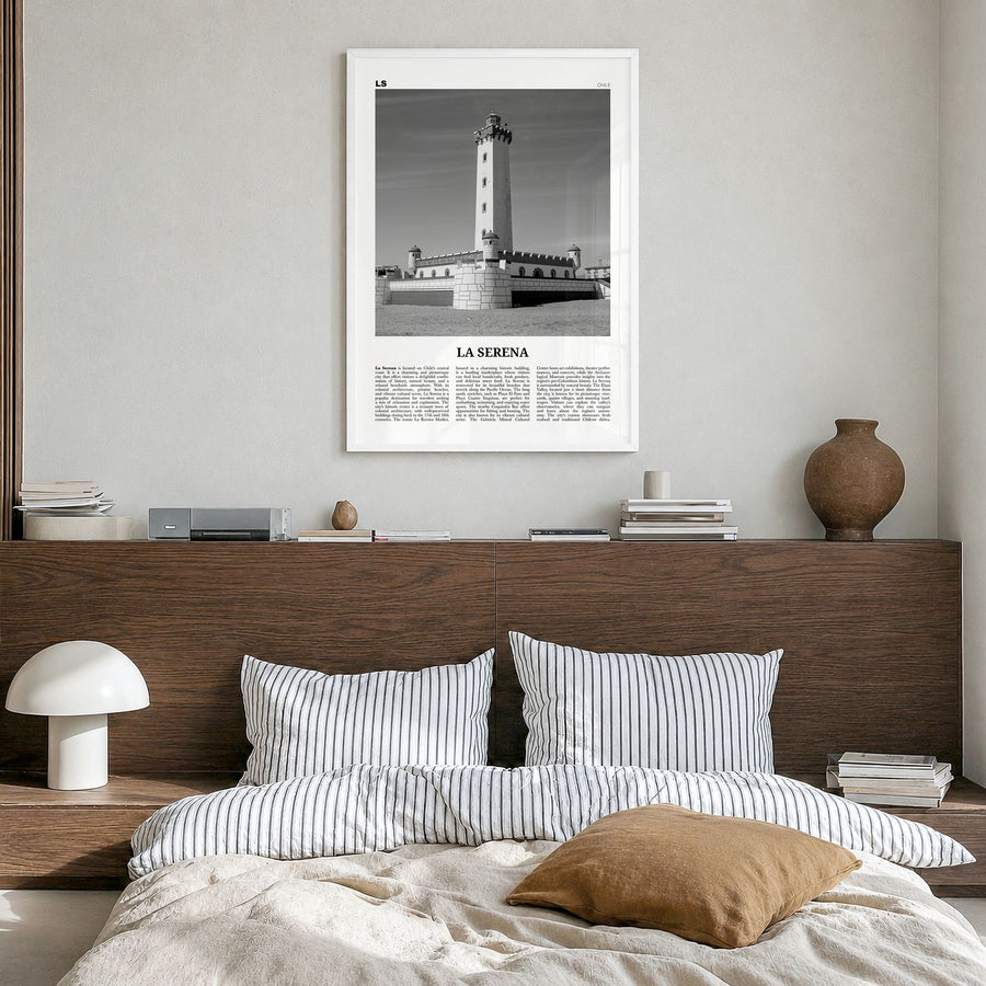 La Serena Newspaper Poster in a white wood frame, hanging in a bedroom