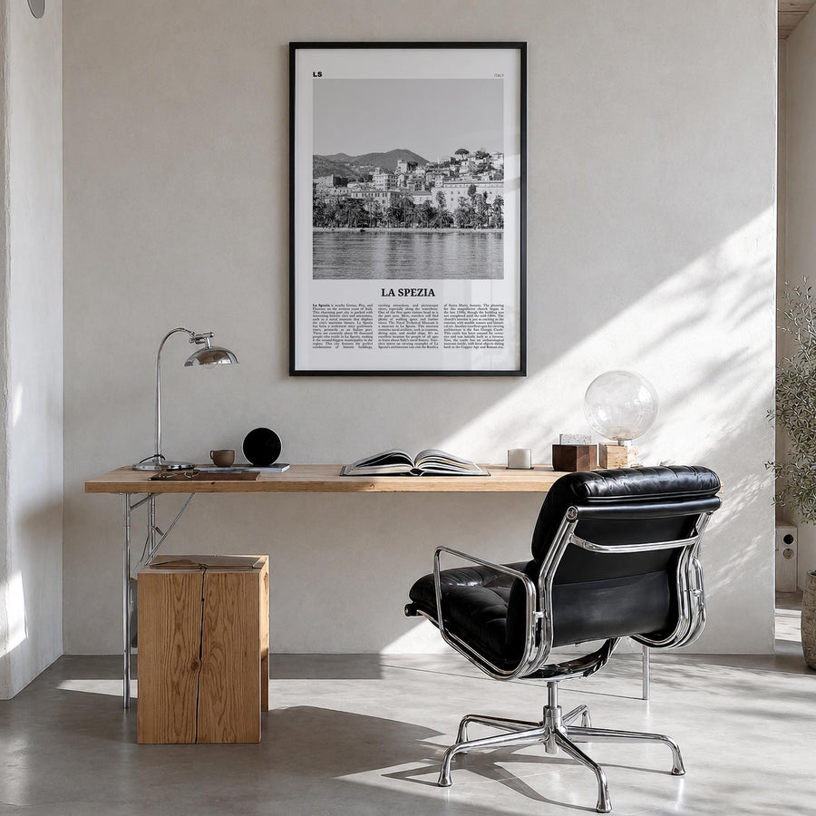 La Spezia black & white newspaper poster of Italy – vertical wall art in black wood frame, hanging on wall