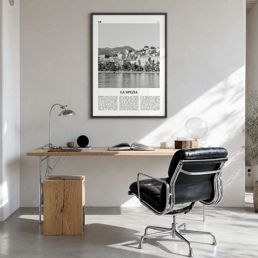 La Spezia Newspaper Poster in a black wood frame, hanging in a bright home office