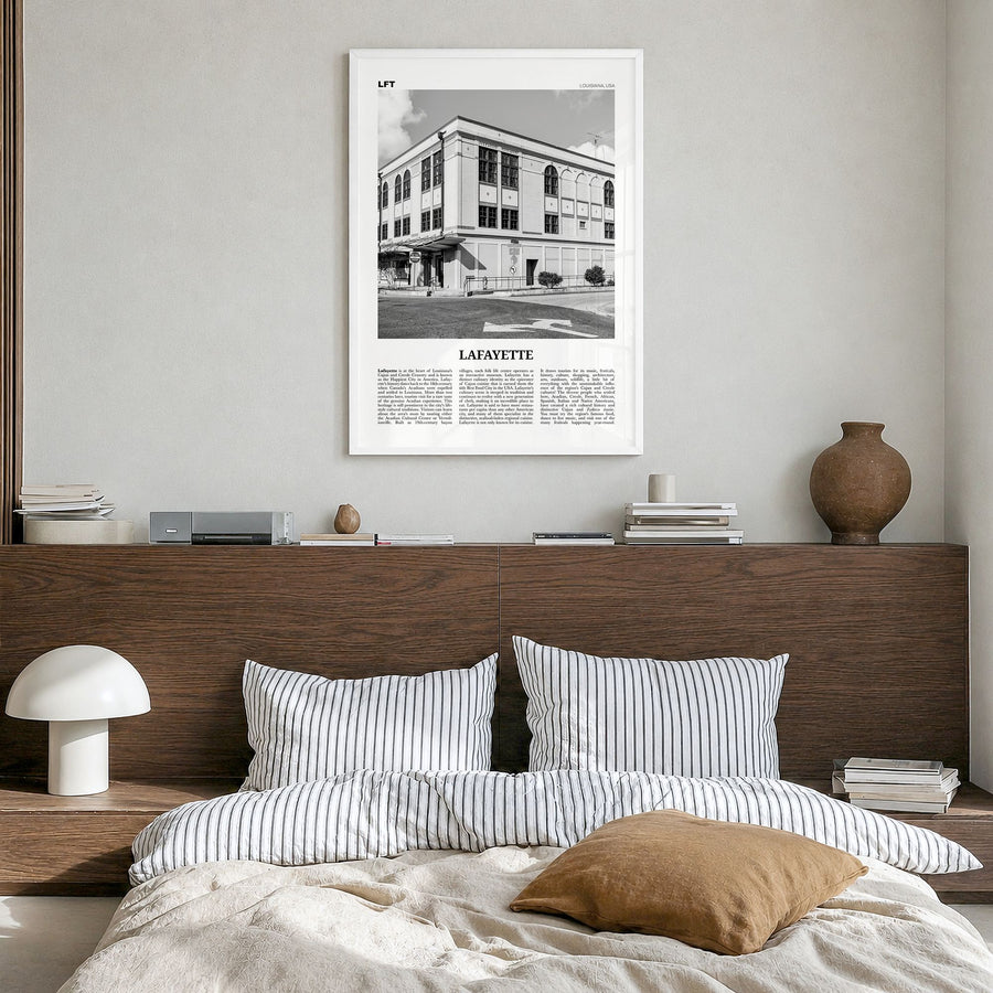 Lafayette, Louisiana Newspaper Poster in a white wood frame, hanging in a bedroom