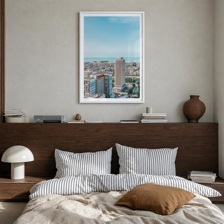 Lagos, Nigeria colorful photo poster of Nigeria – vertical wall art in white wood frame with white border, hanging on wall