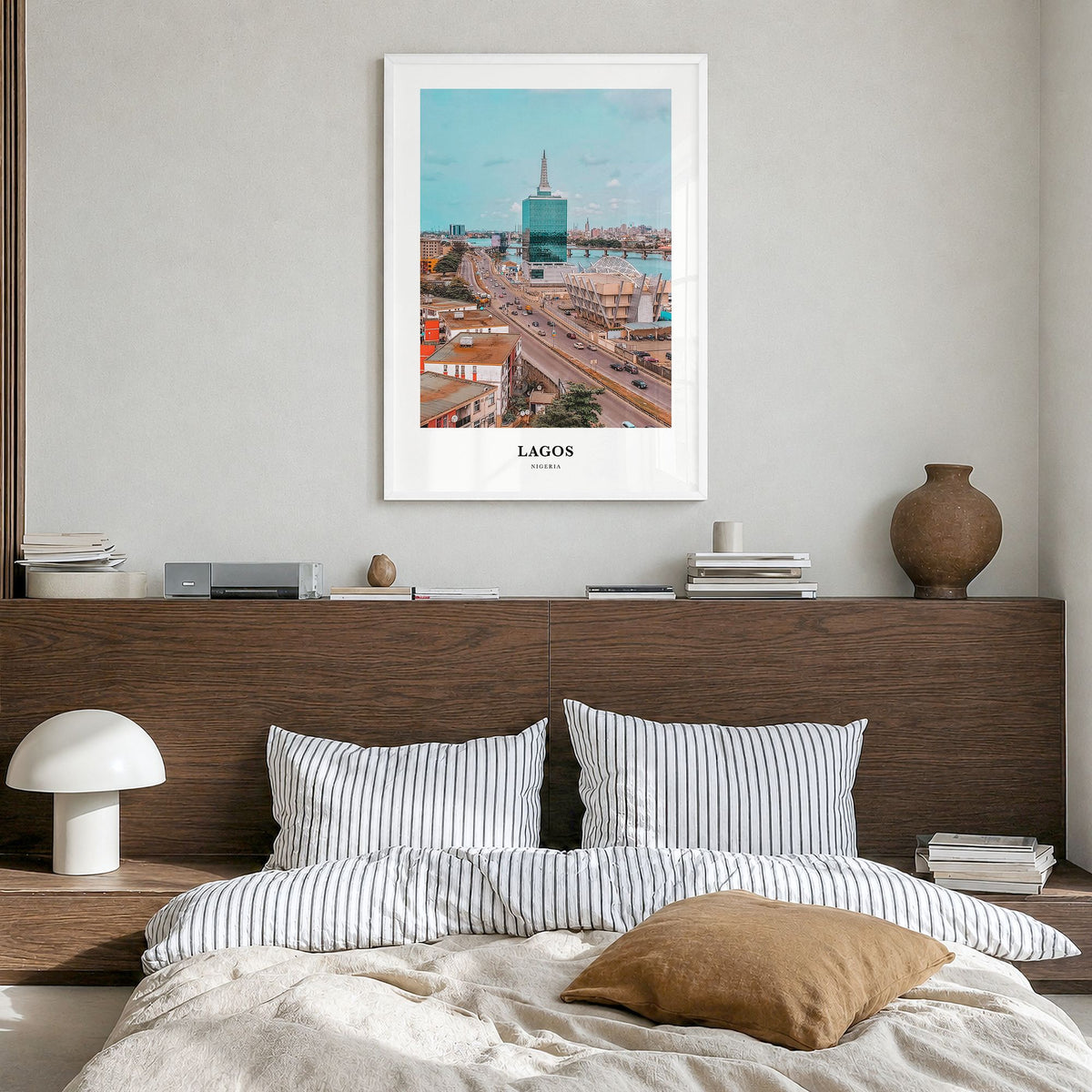 Lagos, Nigeria Classic Poster in a white wood frame, hanging in a bedroom