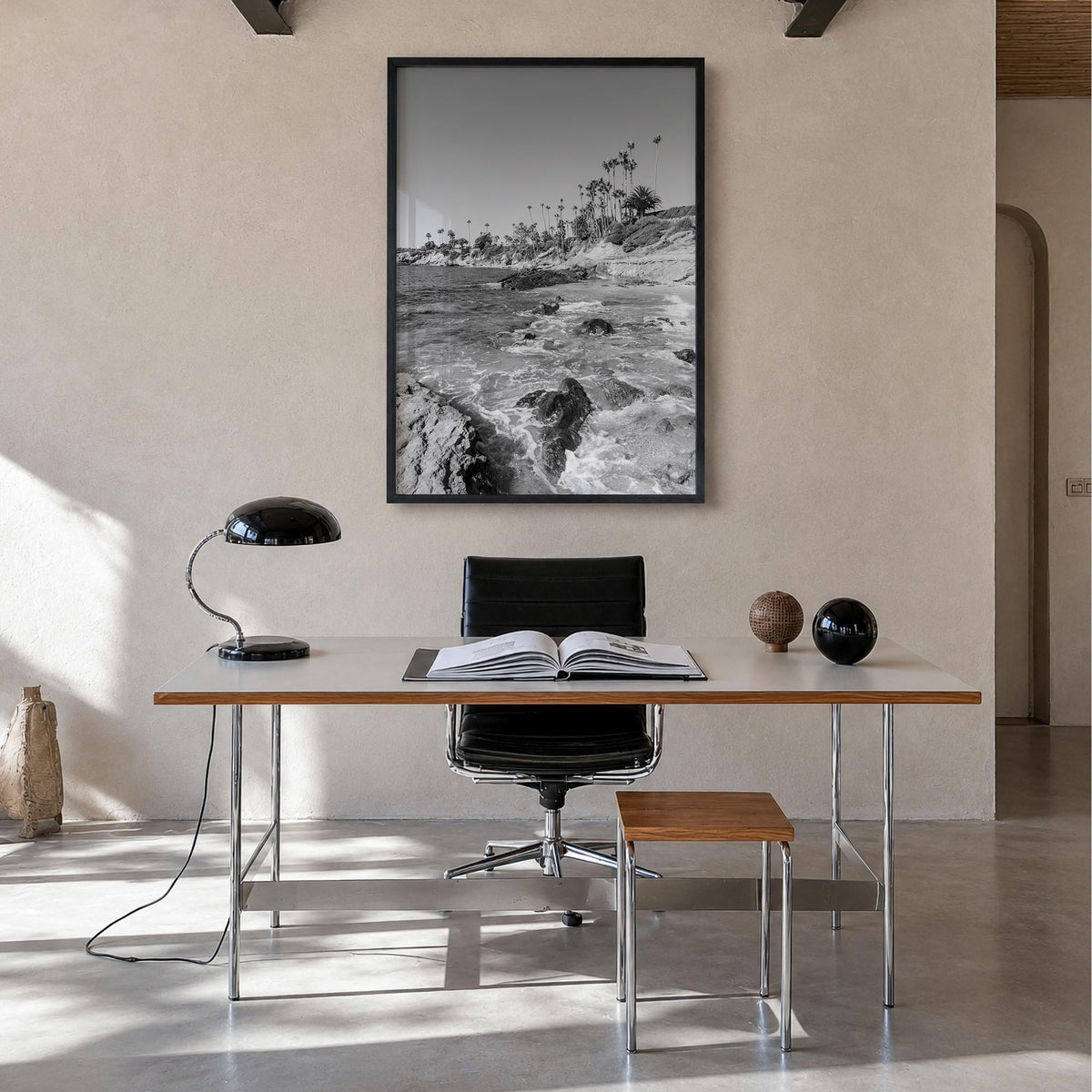 Laguna Beach no. 1 black & white photo poster of California, USA – vertical wall art in black wood frame, hanging on wall