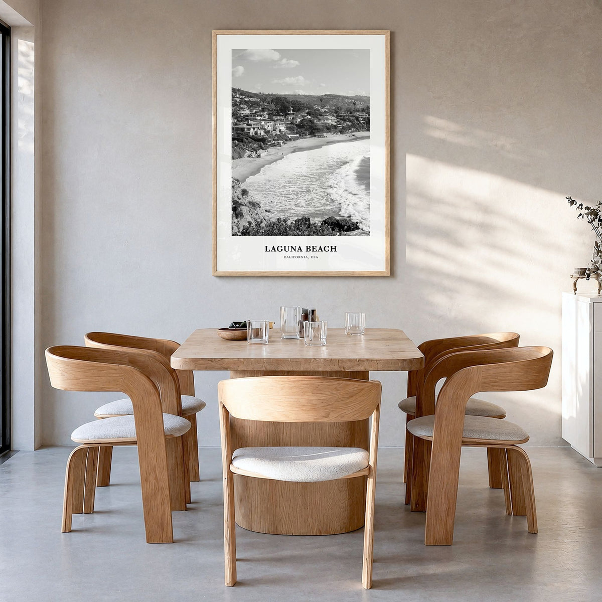 Laguna Beach Classic No 2 Poster in a natural wood frame, hanging in a dining room