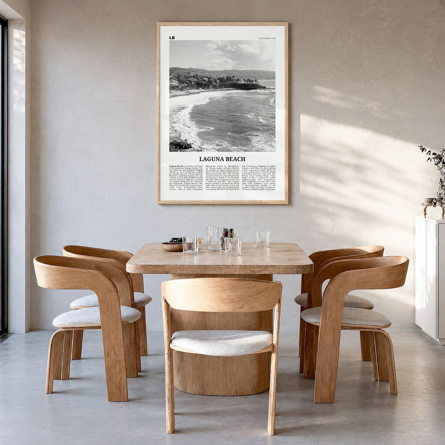 Laguna Beach Newspaper No 1 Poster in a natural wood frame, hanging in a dining room