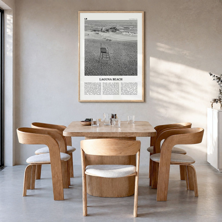 Laguna Beach Newspaper No 2 Poster in a natural wood frame, hanging in a dining room