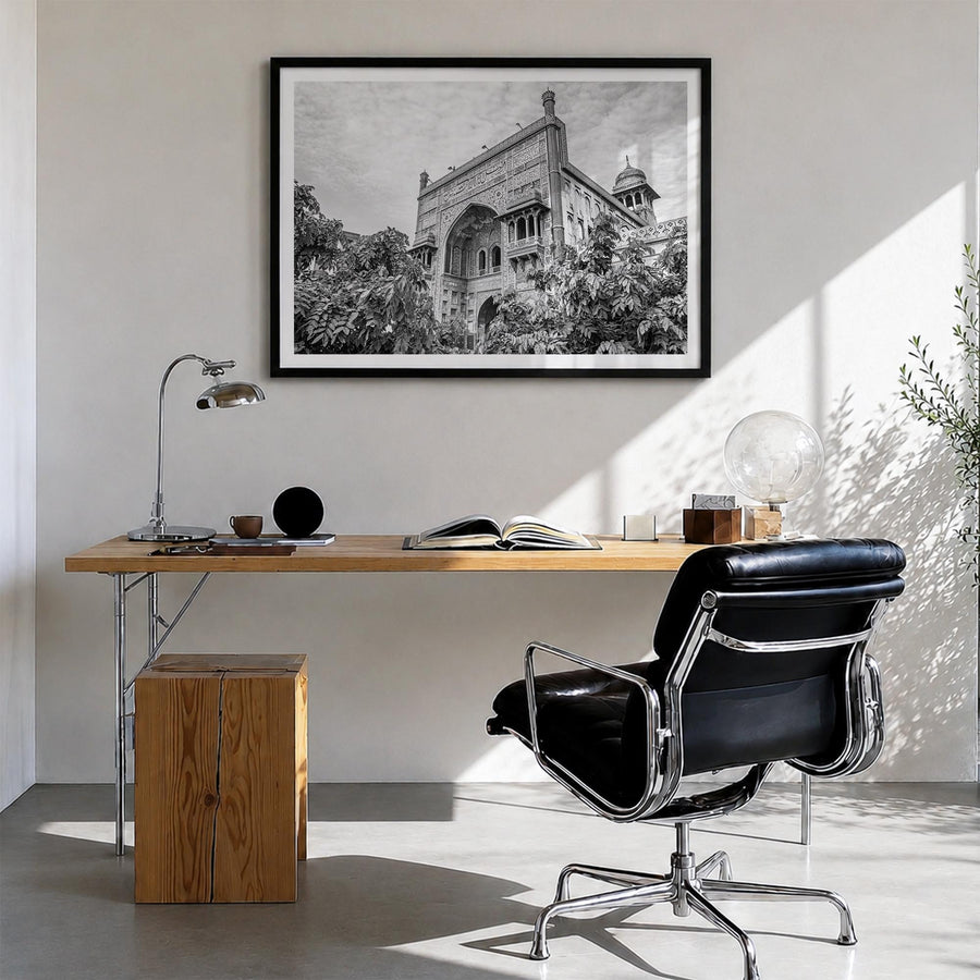Lahore black & white photo poster of Pakistan – horizontal wall art in black wood frame with white border, hanging on wall