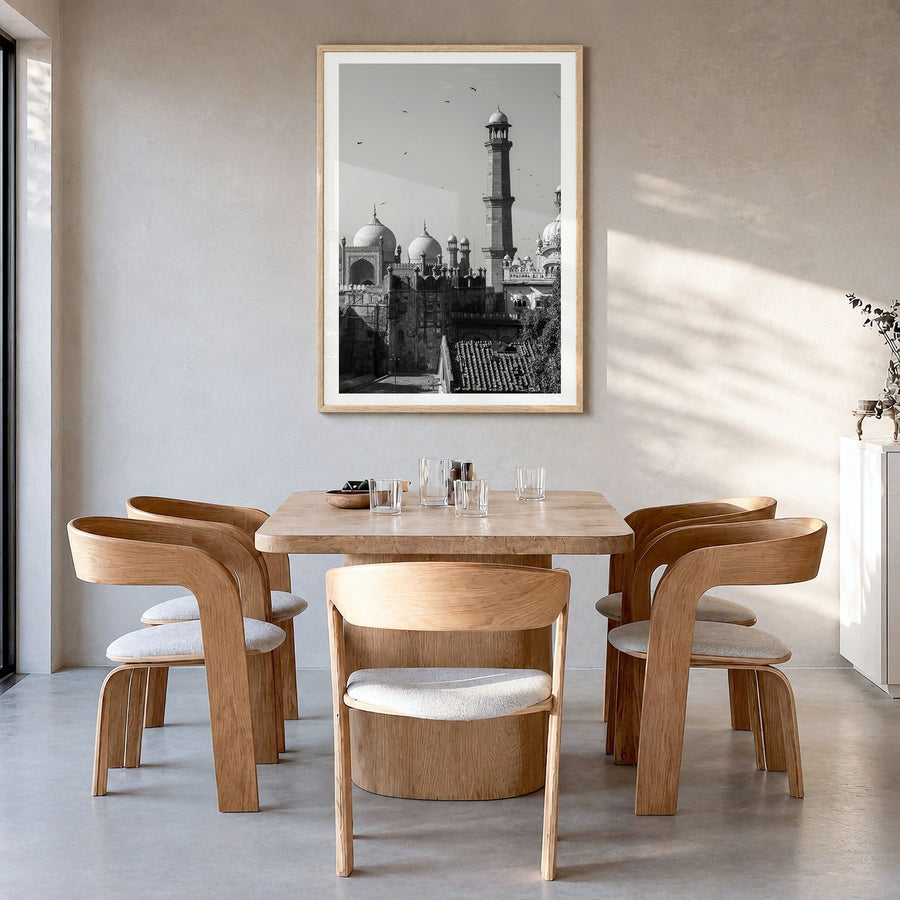 Lahore Photo Poster in a natural wood frame, hanging in a dining room, white border